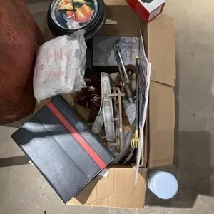 Box of misc items, cup dispenser, clock, and etc