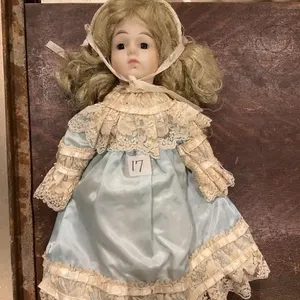 Porcelain doll. 18T