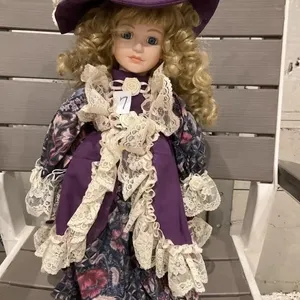 Porcelain doll with stand. 16T