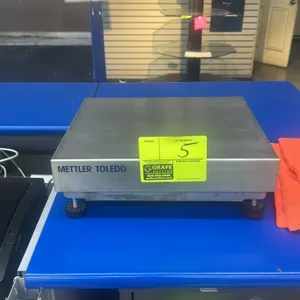 Mettler Toledo stainless steel platform scale base. Features durable stainless steel platform construction and four adjustable leveling feet. Includes