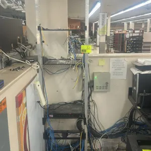 Metal 2-post open-frame IT server rack. Features aluminum construction with multiple integrated equipment shelves. Floor-standing design. Note: Rack o