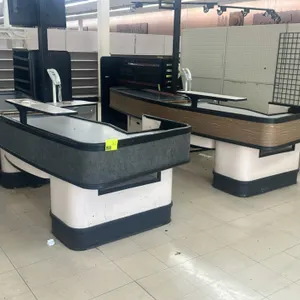 Load King single belt checkout lane. Features a motorized conveyor belt, integrated check writing shelf, and cash drawer compartment. Measures 141"L x