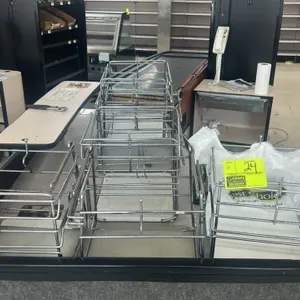 Stainless steel wire checkout bag stand. Features a wire frame design with hooks for holding plastic grocery bags. Designed for grocery checkout lane 