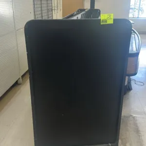 Portable candy and magazine display rack. Features double-sided display with multi-tier angled wire shelves for candy on one side, and wire magazine r