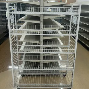Cape Cod multi-tier portable wire merchandising rack. Features white wire construction with five basket-style shelves, side grids, and a 'Cape Cod Pot