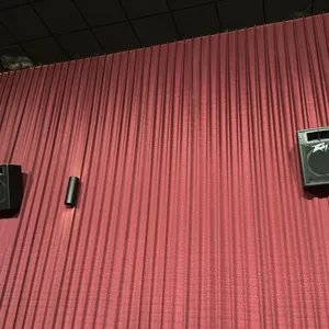 Peavey professional movie theater audio speaker. Features a two-way design with a horn-loaded high-frequency driver and a woofer protected by a metal 