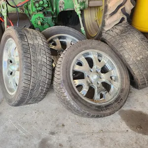 (4) Cooper Discoverer HT Plus Tires and Chrome Wheels