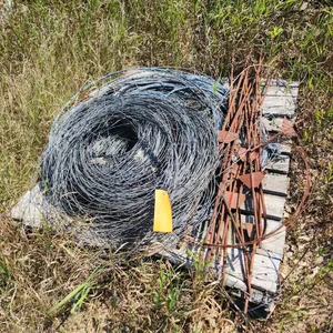 Pallet of Galvanized Fencing Wire and Metal Stakes