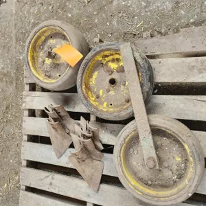 (3) Gauge Wheels and (4) Cultivator Sweeps