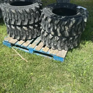 (4) 12-16.5 N.H.S SKID STEER TIRES (APPEAR NEARLY NEW)