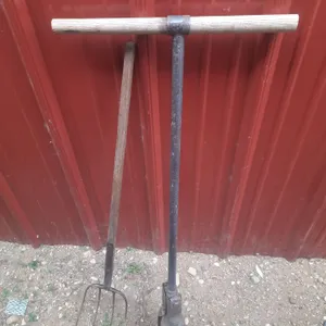 Pitchfork and  manual post hole digger.