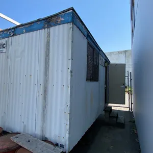 ARCTIC PORTABLE TRAILER BUILDING, WHITE, HAS DRAFTINGS DESK & ASSORTED OFFICE ITEMS,