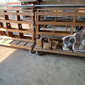 PAIR OF WOOD A-FRAME PANEL CARTS WITH ASSORTED ITEMS - CARTS MEASURE APPROX 6'L X 3'D X 4'9"H
