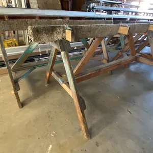 GROUP OF 4 LARGE WOODEN SAWHORSES APPROX 8'L
