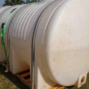 1600 GAL FIBERGLASS TANK, COUPLE CRACKS FIXED
