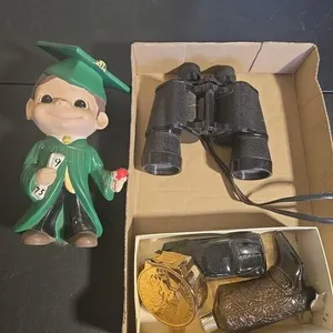 Avon Bottles And Binoculars