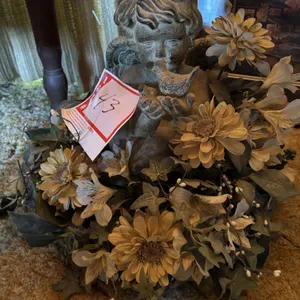 Angel in flower arrangement