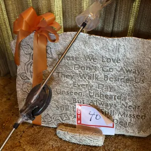 Memorial plaque, and light