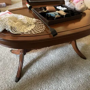 Coffee table, stuffed bear, alarm clock, lace, 36x20x26"