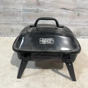 Portable charcoal grill