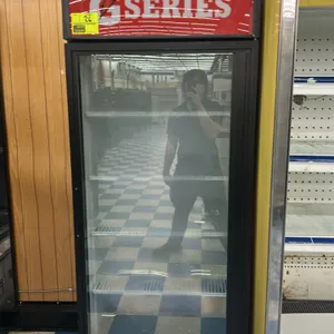 True GDM-26 self-contained glass door beverage cooler. Features Gatorade G Series graphics, 4 adjustable wire shelves, and interior lighting. S/N: 1-4