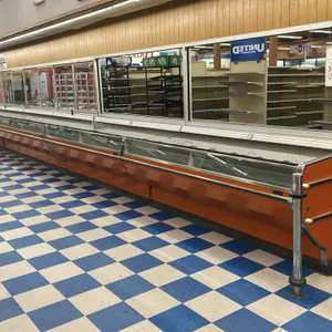Tyler open-air meat merchandising cases. Features wire shelving and orange exterior panels. Dimensions: 12'L and 8'L. Electrical: 115V, 1-Phase. Note: