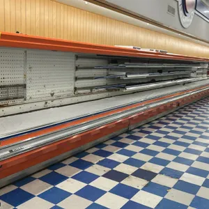 Hill multi-tier open display cases. Features solid shelving, interior lighting, and pegboard backing. 12'L. Electrical: 115V, 1-Phase. Note: Units sho