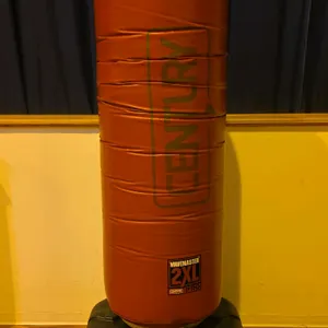 Century Wavemaster 2XL Pro freestanding punching bag. Features a red vinyl-covered foam striking surface and a black plastic base designed to be fille