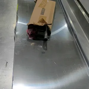 Stainless steel prep table undershelf with assembly parts. Features corner collar leg sockets and includes boxed 450mm posts. Dimensions: 60"L x 18"W.