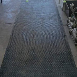 Unbranded rubber runner mat. Features a black diamond plate textured surface and beveled edges designed for slip resistance and anti-fatigue. Dimensio