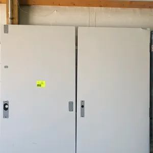 Steel doors. Features a flush design pre-cut for hardware and hinges. Gray painted finish. Dimensions: 36"W x 84"H each. Note: Frames and hardware not