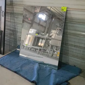 Frameless mirror and glass pane. Dimensions: 42" x 48". Note: Furniture blanket is not included.