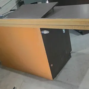 Laminate counter with sink. Features a single-compartment stainless steel drop-in sink, a gooseneck faucet with dual controls, and a hinged raised pla