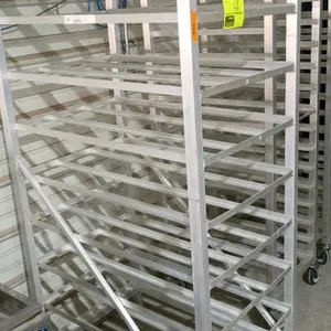 Aluminum can rack. Features a multi-tier gravity-feed design with slanted shelves designed to hold cans up to 7" in diameter. Aluminum construction. M