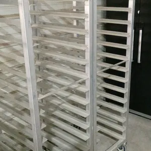 Aluminum rolling channel racks. Features multi-tier channel slides for pan storage. Sturdy aluminum construction. Dimensions: 21"x26"x69". Mounted on 