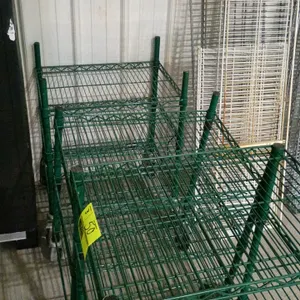 Metro rolling wire shelving racks. Features green epoxy-coated wire construction. 24"x18"x32". Mounted on casters. Background items not included.