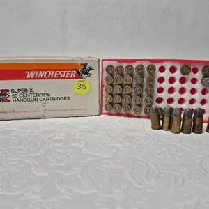 APPROX 35 ROUNDS OF 32 SHOT COLT AMMUNITION