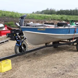 Prowler 14' aluminum boat, Serial 243014, with Evinrude 15hp motor, Serial 7006722, not tested at ti