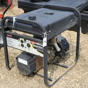 Coleman Powermate 6250 10hp generator, bought for Y2K, never run. Not running at time of cataloging