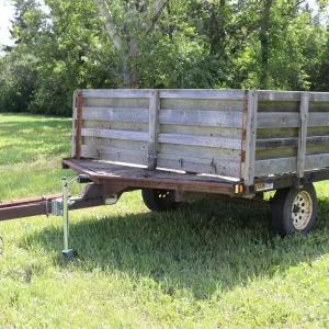 1999 Road Sport snowmobile/ATV trailer manufactured by Dyson Trailers with pull out ramp, used as ut