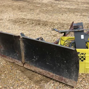 Polaris 54" wide adjustable plow blade to fit Lot 1. Comes with winch and mounting brackets