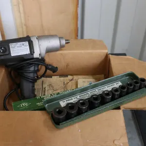 Black and Decker Bulldawg 1/2" electric impact and 10 impact socket set with case, working at time o