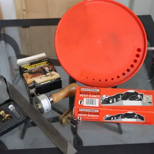 Universal work holder, a Veritas optical center punch, a General wheel and circle cutter, Footprint 