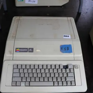 Vintage 1980s Apple IIE. See photos for internals , untested at time of cataloguing