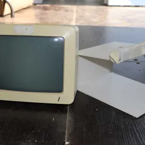 Vintage Apple Monitor with stand. Untested at time of cataloguing