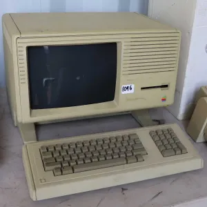 Vintage 1980s Apple Lisa 2 computer with keyboard. Tear in screen fabric. See photos for internals ,