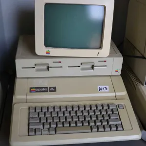 Vintage 1980s Apple IIE with Apple Duo Disk, and Apple Monitor. See photos for internals , untested 