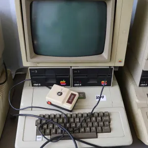 Vintage 1980s Apple II Plus with two Apple Disk II disk drives, Apple Monitor II, and Vintage ANKO j