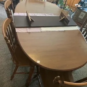 Maple table w extra leaf and six chairs 69x41.