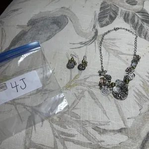 Silver color  and green necklace and earrings